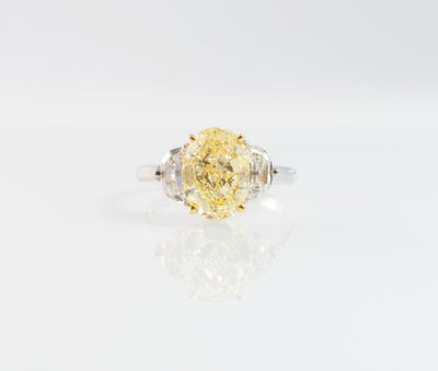 "Sun Dance" GIA Certified 5.02-Carat Fancy Yellow Diamond Ring