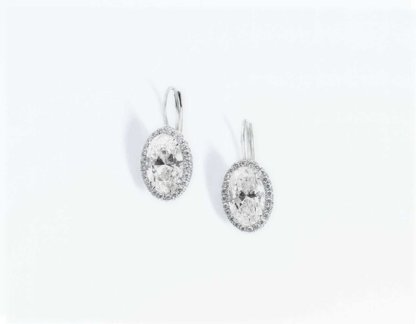 "Frosty Tales" 4-carats White Diamonds Oval Drop Earrings GIA