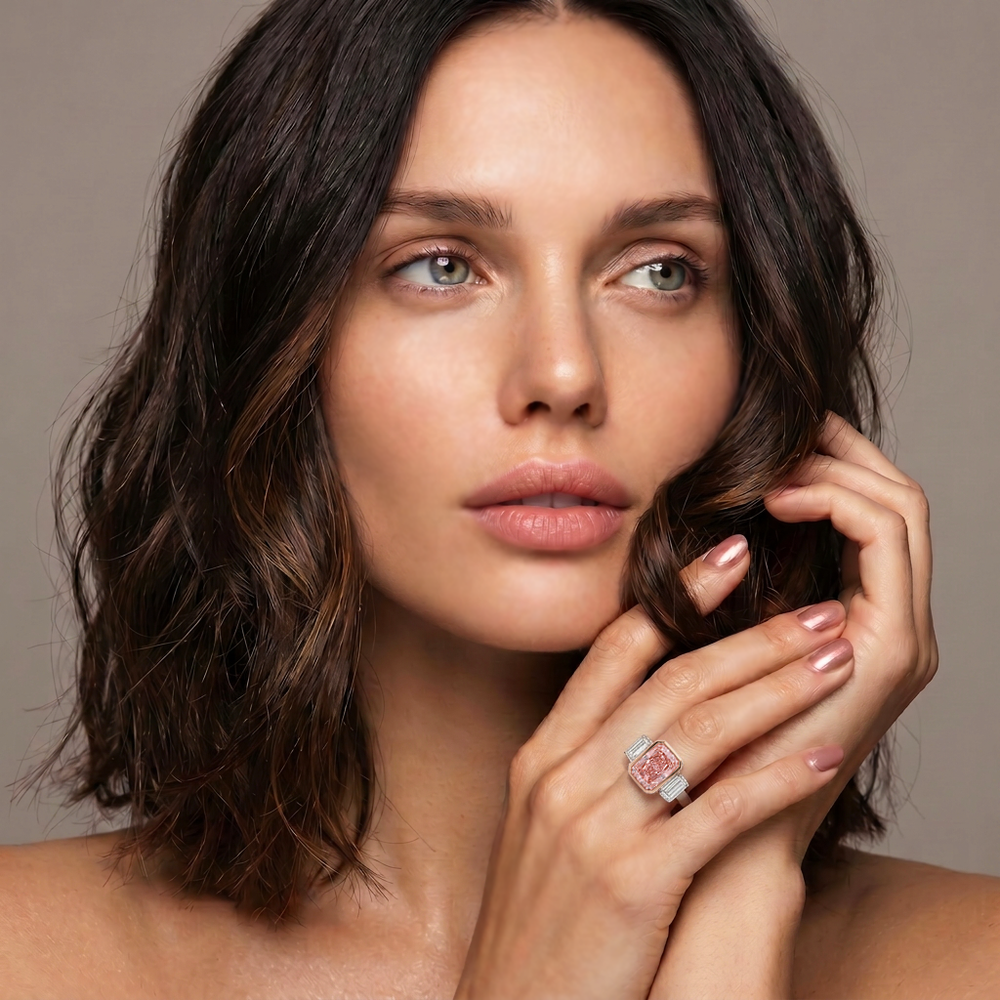 Model wearing the Azuri Fancy Vivid Pink radiant-cut three-stone lab-grown diamond ring