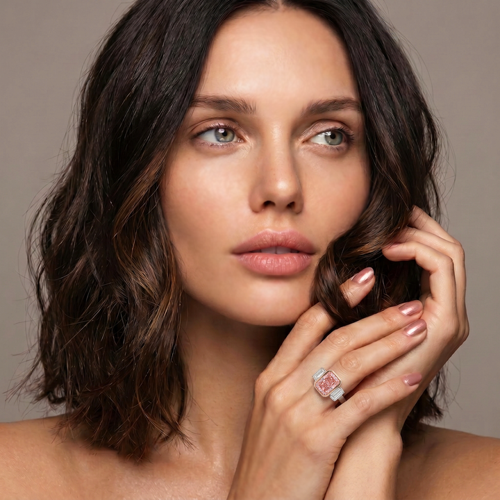 Model wearing the Azuri Fancy Vivid Pink radiant-cut three-stone lab-grown diamond ring