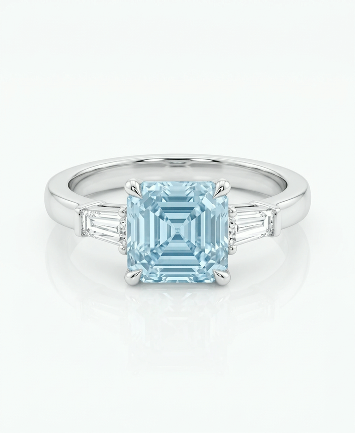2 ct fancy blue Asscher-cut lab-grown diamond ring with tapered baguette side stones in 14K white gold, front view