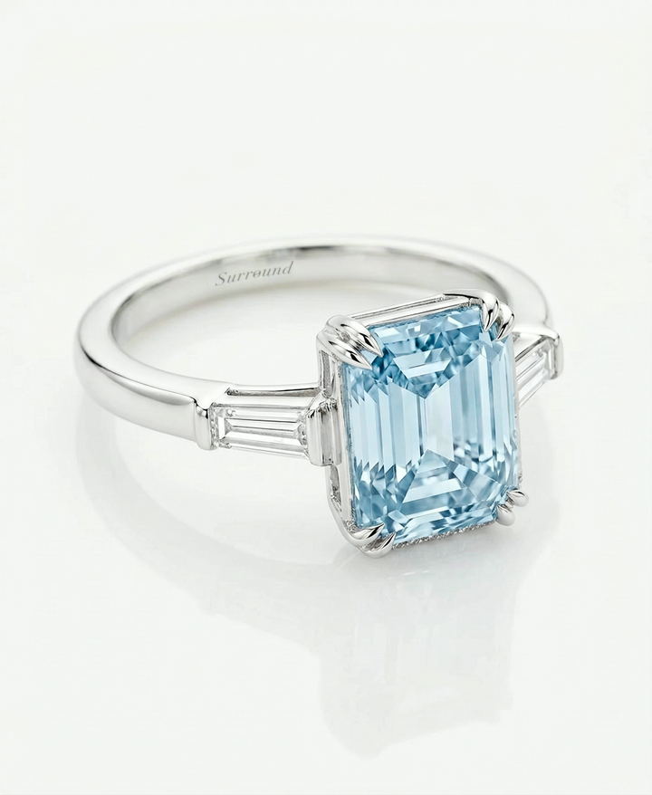 4 ct fancy blue emerald-cut lab-grown diamond ring with baguette side stones, no halo, in 14K white gold