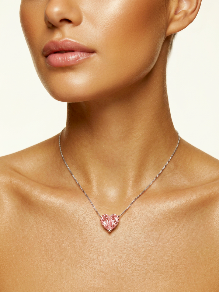 Model wearing the 6.02 ct Fancy Vivid Pink heart lab-grown diamond pendant