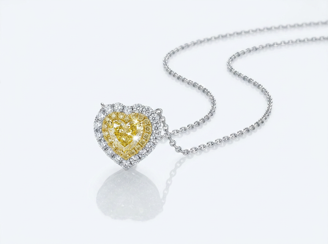 Fancy Vivid Yellow heart lab-grown diamond pendant necklace — angled detail view