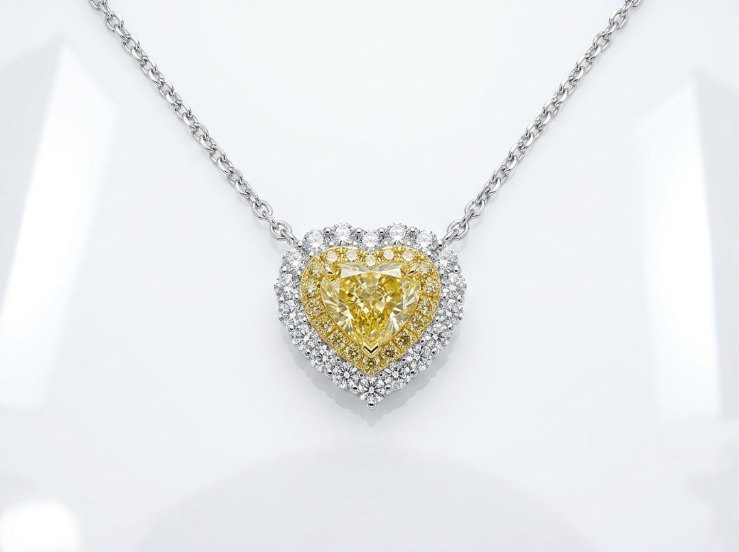 Fancy Vivid Yellow heart-shape lab-grown diamond pendant with two-tone double pavé halo on an 18-inch white gold chain — front view