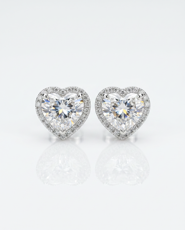 Heart-shape lab-grown diamond halo stud earrings with micro-pavé halos in 14K white gold — studio view