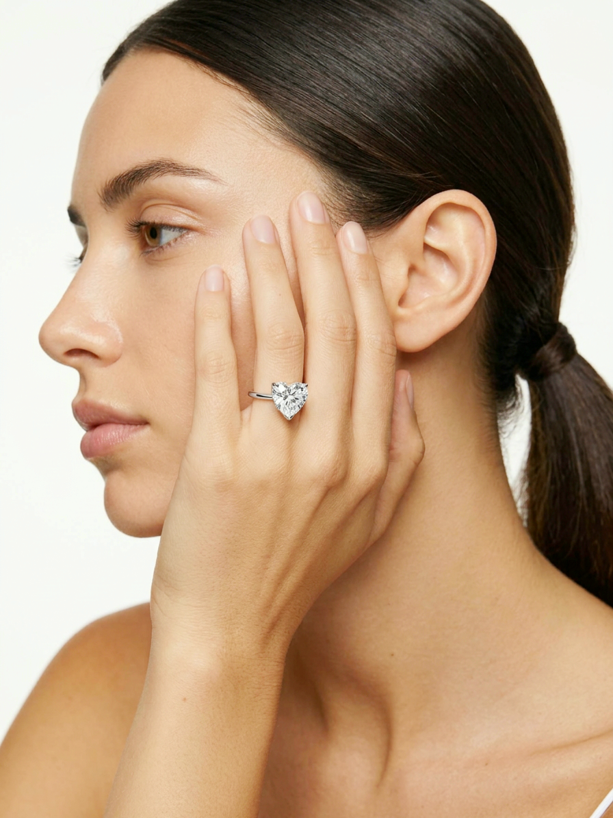 Model wearing the 5 ct heart-shaped lab-grown diamond solitaire ring