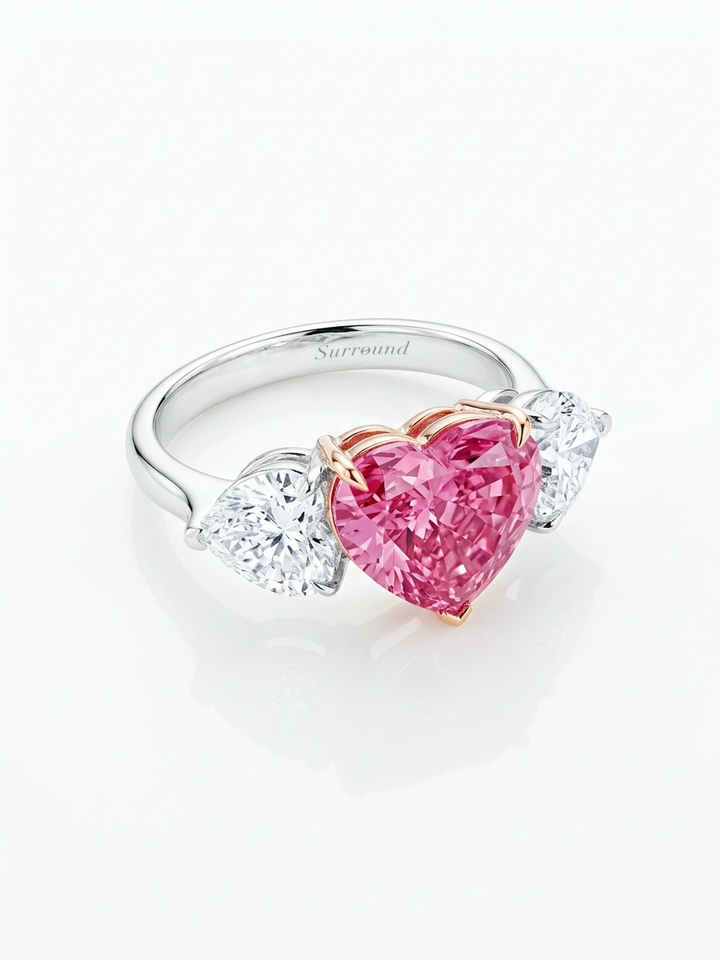 5.02 ct pink heart lab-grown diamond three-stone ring with D VS1 heart sides in 18K white gold
