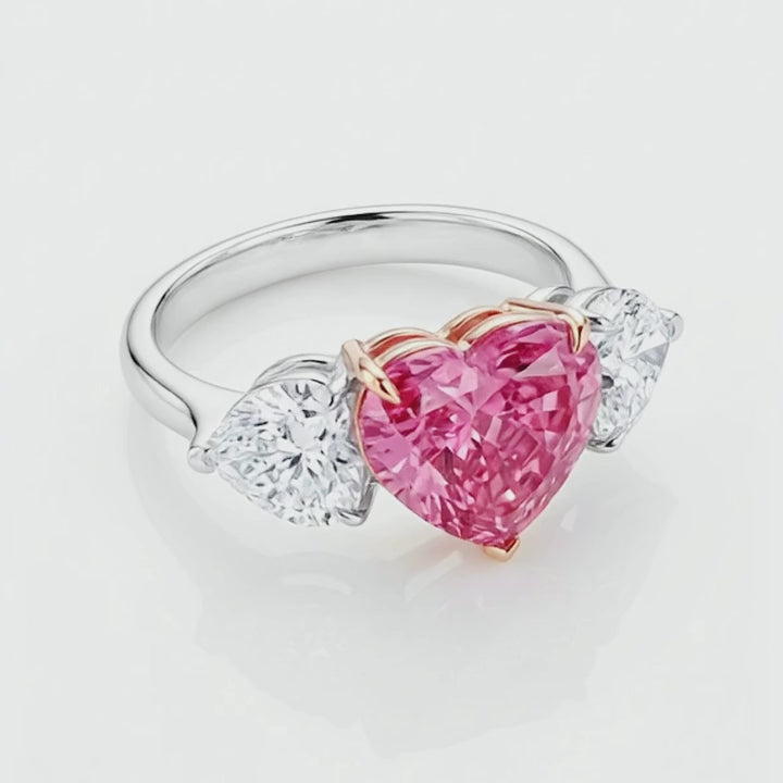 Rotation video of the pink heart lab-grown diamond three-stone ring