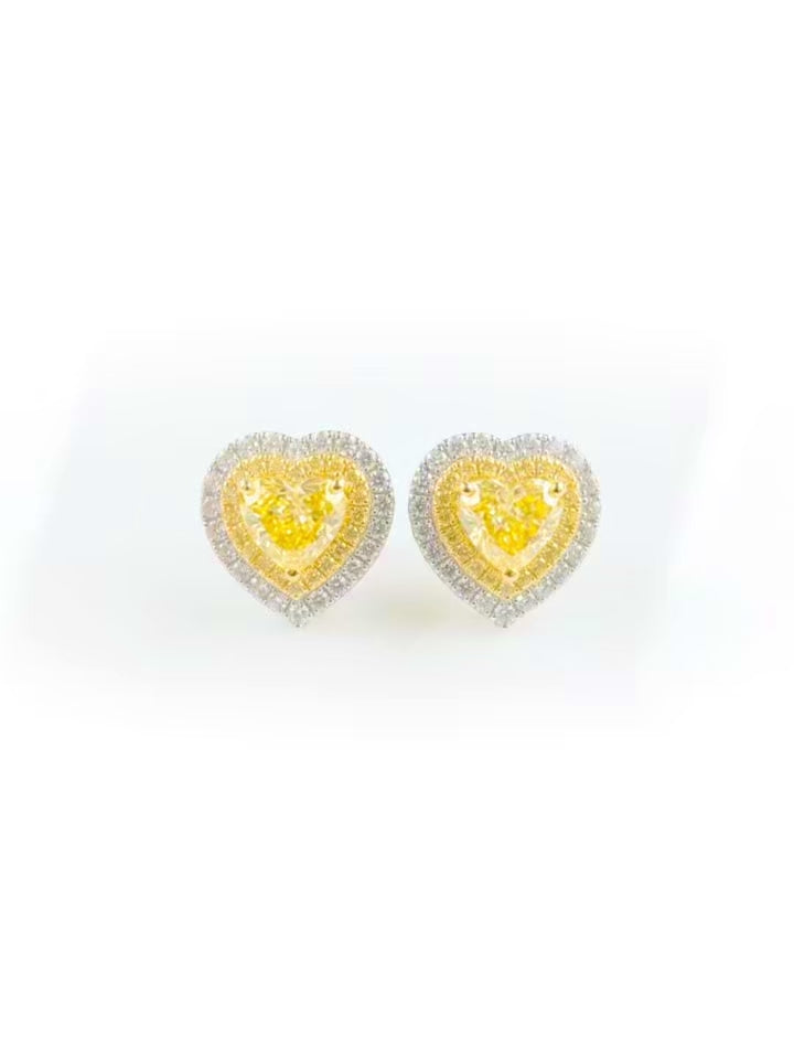 Video of the Fancy Vivid Yellow heart-shape lab-grown diamond stud earrings