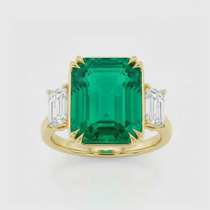 Rotation video of the 10.46 ct lab-grown emerald three-stone ring
