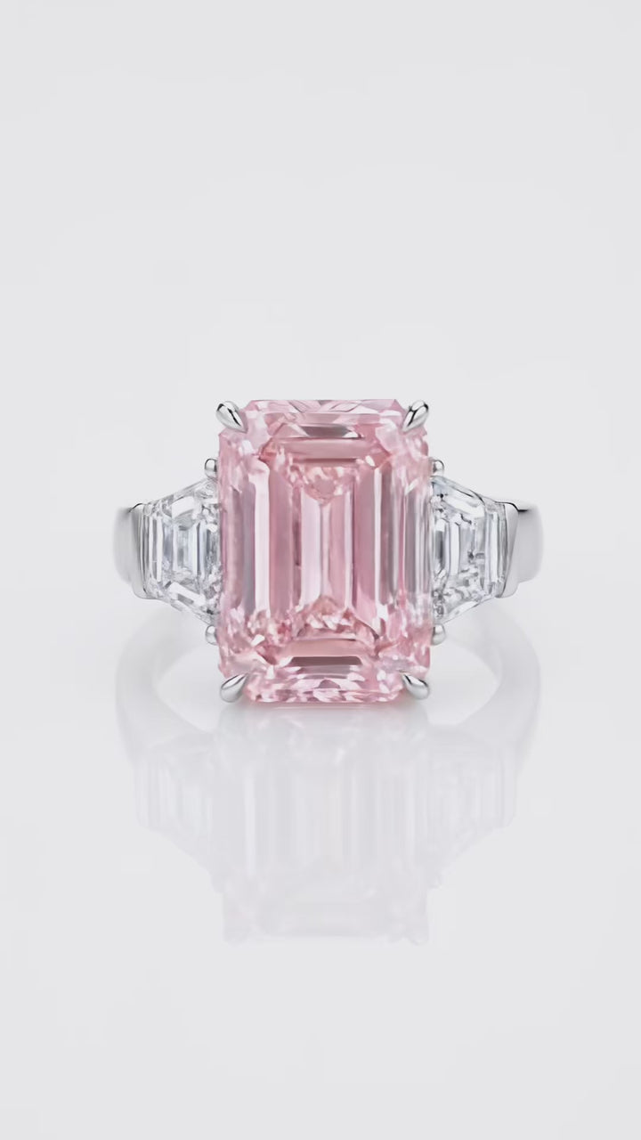 Video of the 7.5 ct Fancy Vivid Pink emerald-cut lab-grown diamond three-stone ring