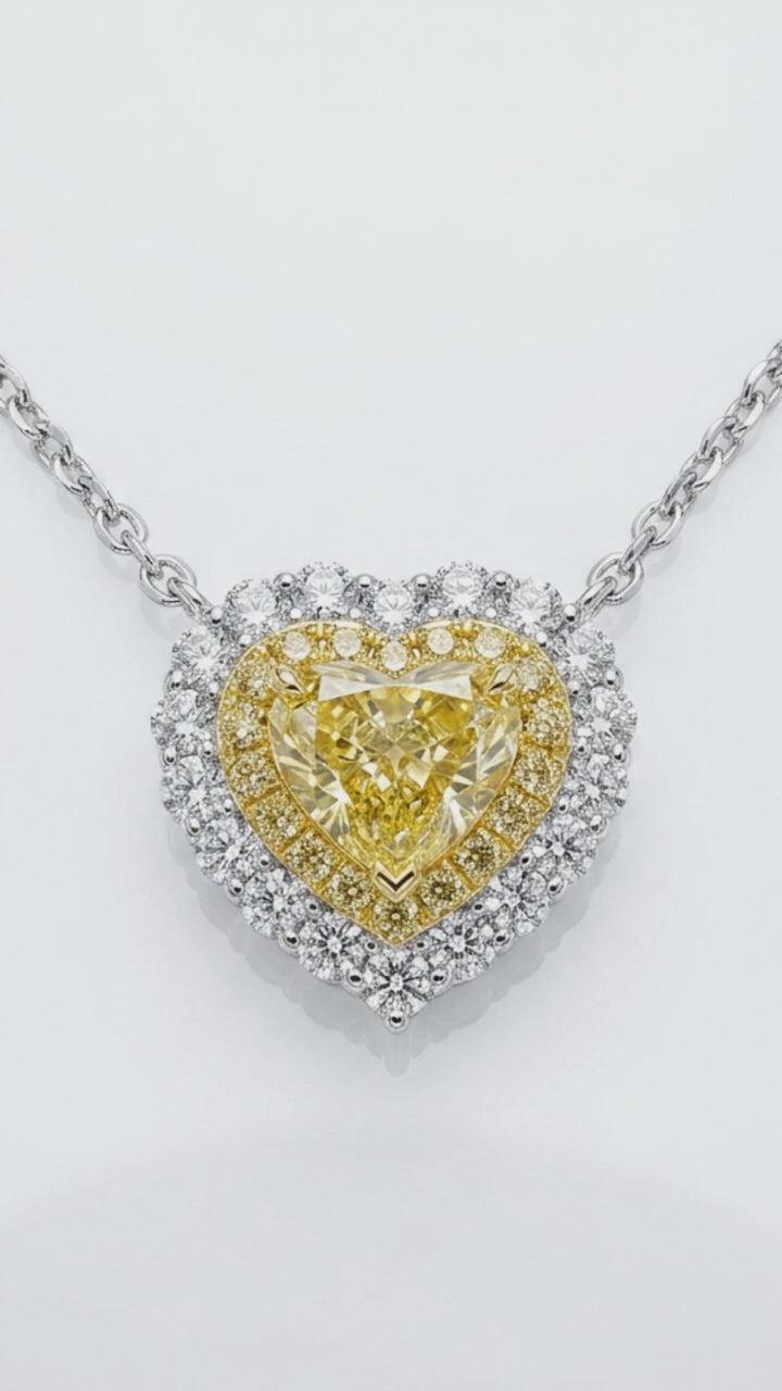 Video of the Fancy Vivid Yellow heart-shape lab-grown diamond pendant