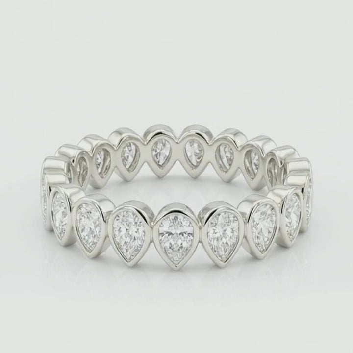 Rotation video of the pear lab-grown diamond bezel eternity band