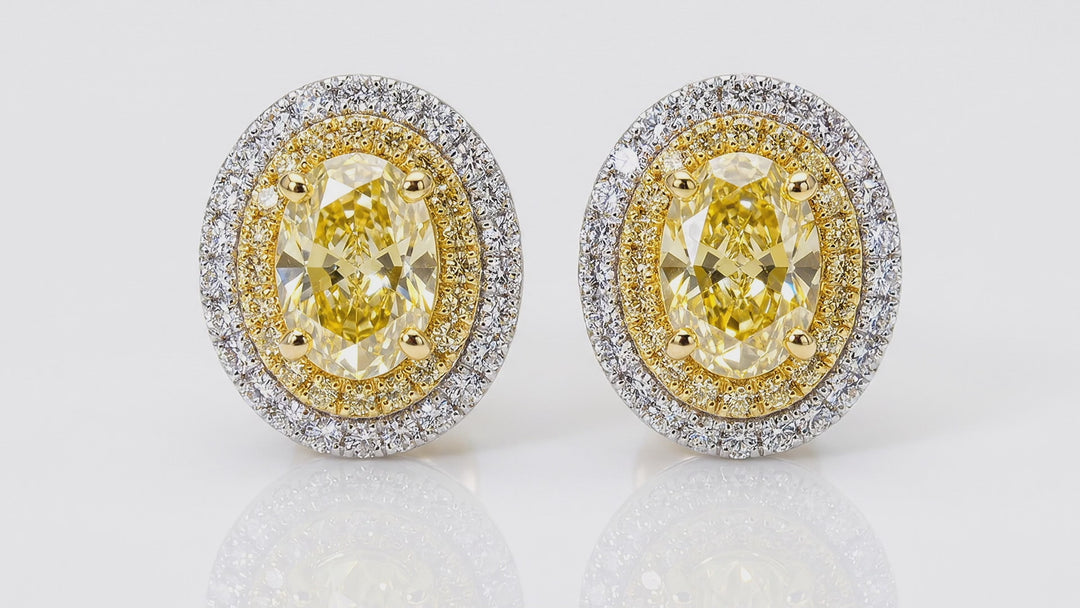 Video of the Fancy Vivid Yellow oval lab-grown diamond double halo stud earrings