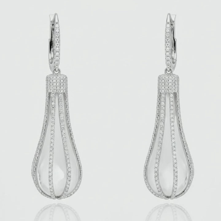 Shimmer video of the carved rock crystal and diamond pavé drop earrings