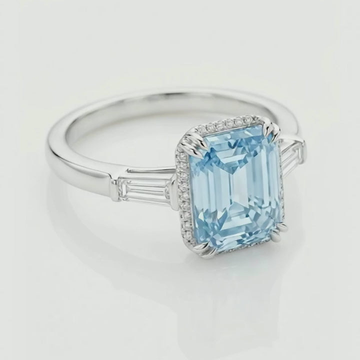 Rotation video of the 4 ct fancy blue emerald-cut diamond halo ring