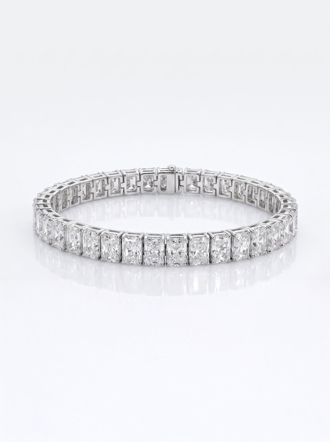 22 ct total weight radiant-cut lab-grown diamond tennis bracelet in 14K white gold with hidden box clasp — studio view