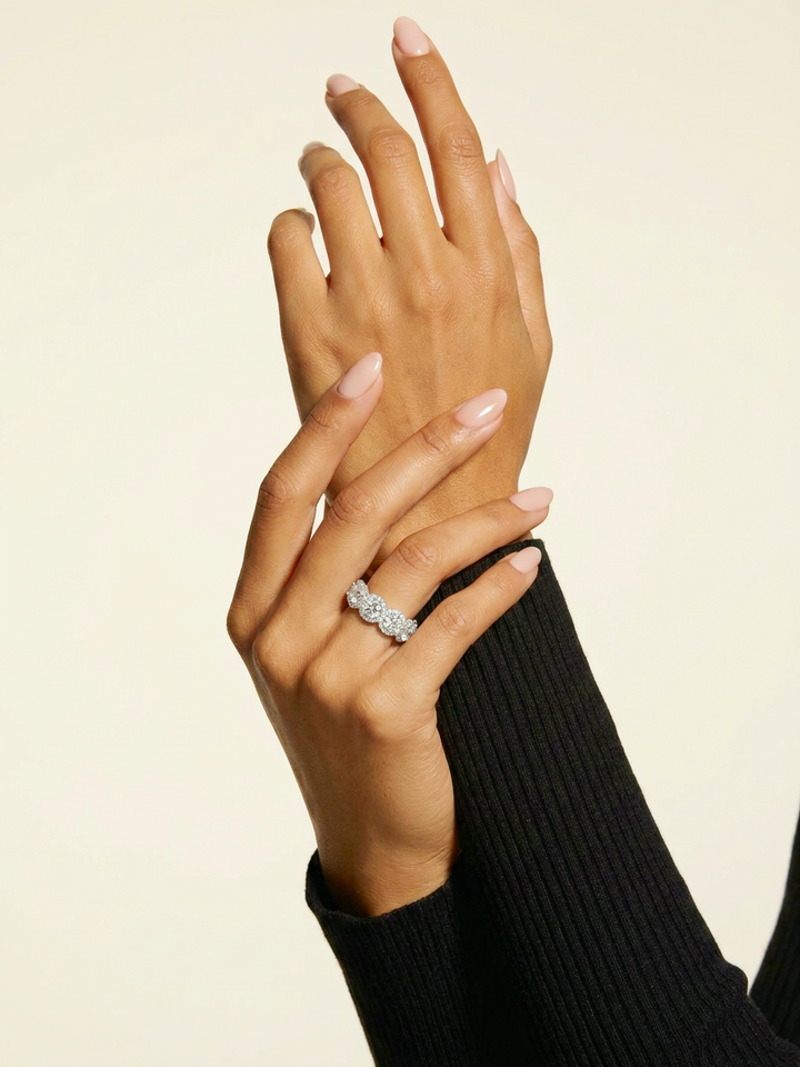 Model wearing the round brilliant lab-grown diamond halo eternity band